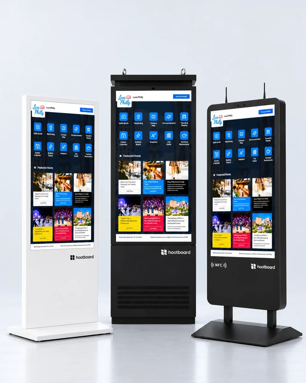HootBoard Glide, Versi and AirX touchscreen kiosks side by side in a studio